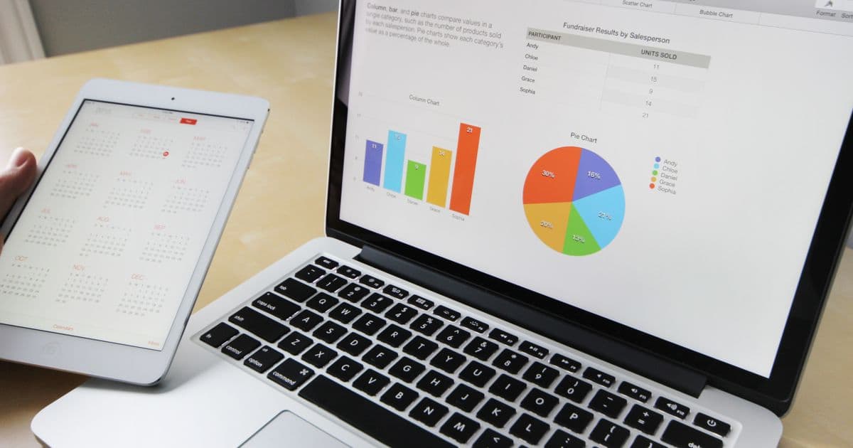 Magnifying glass over documents to spot a scam competition
